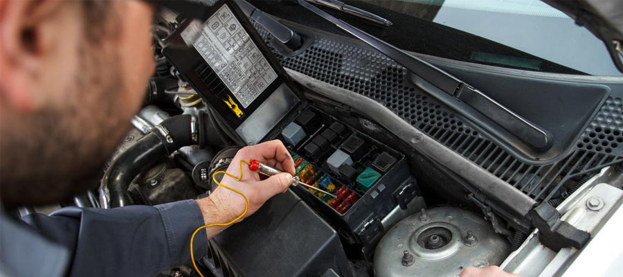 Man Fitting an Alarm